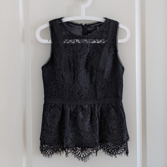 White House Black Market Tops - S O L D🏷️White House Black Market black lace sleeveless peplum top (size 2)